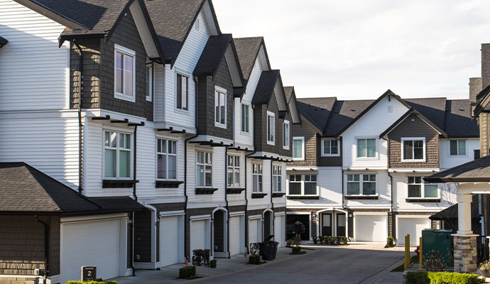 A row of modern three-story multifamily house