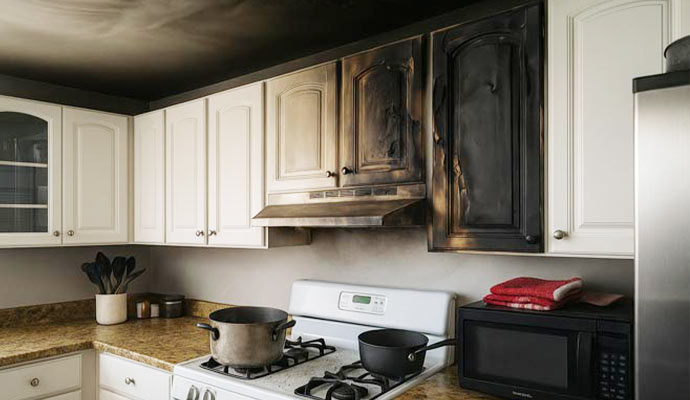 Fire and smoke damaged kitchen interior