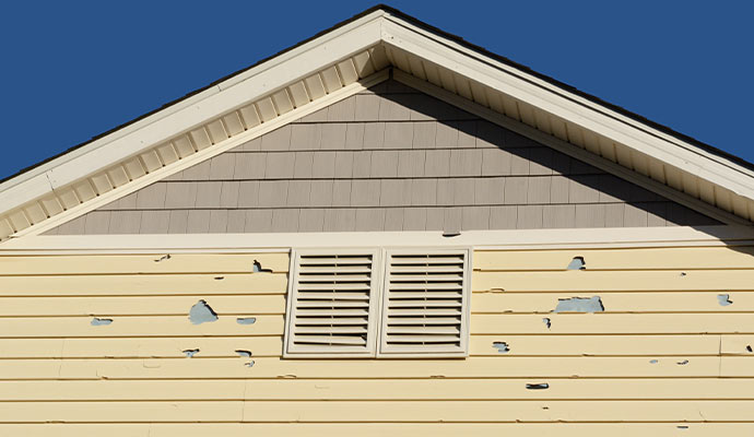 House wall damaged by hail