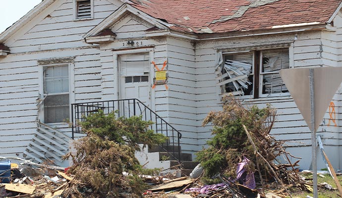 Tropical storm damaged house
