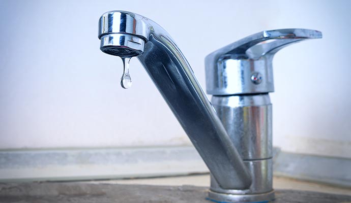 Water dripping from faucet